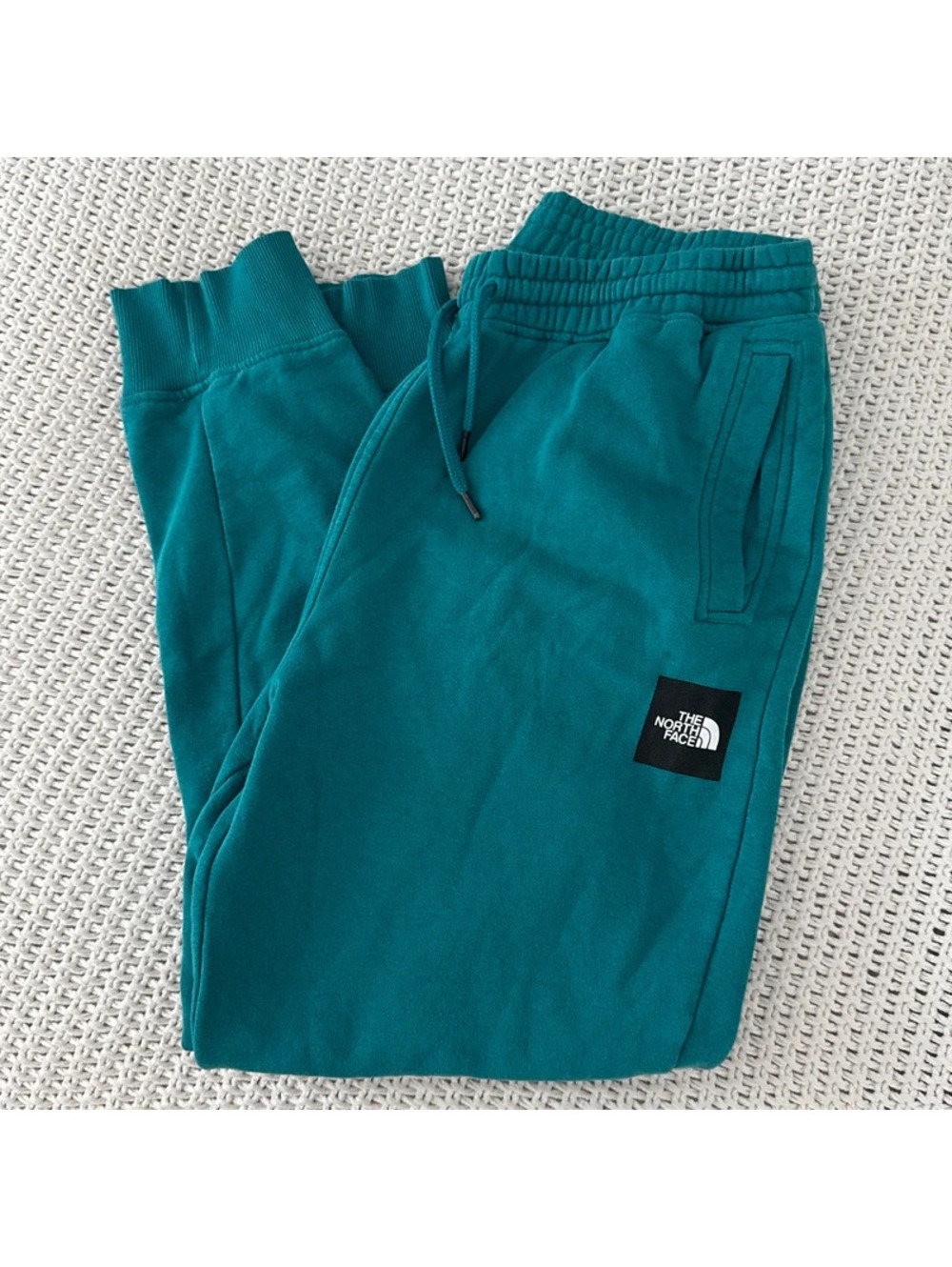 The north face men’s teal jogger pants